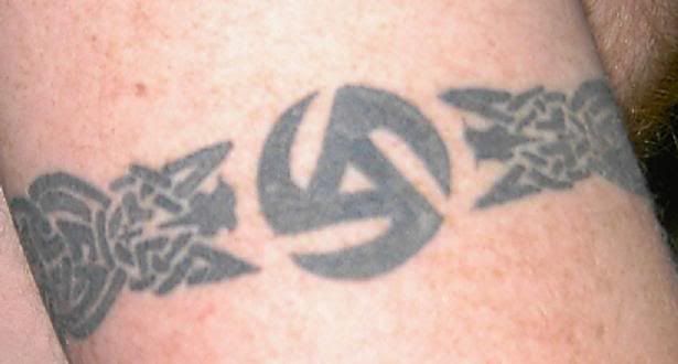 I also have a snowboard tattoo. Mine's on my right arm: