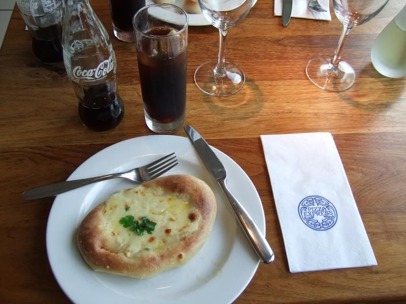 Nicest pizza express ever...definitelynot what we expected...plus bottled coke! Pictures, Images and Photos