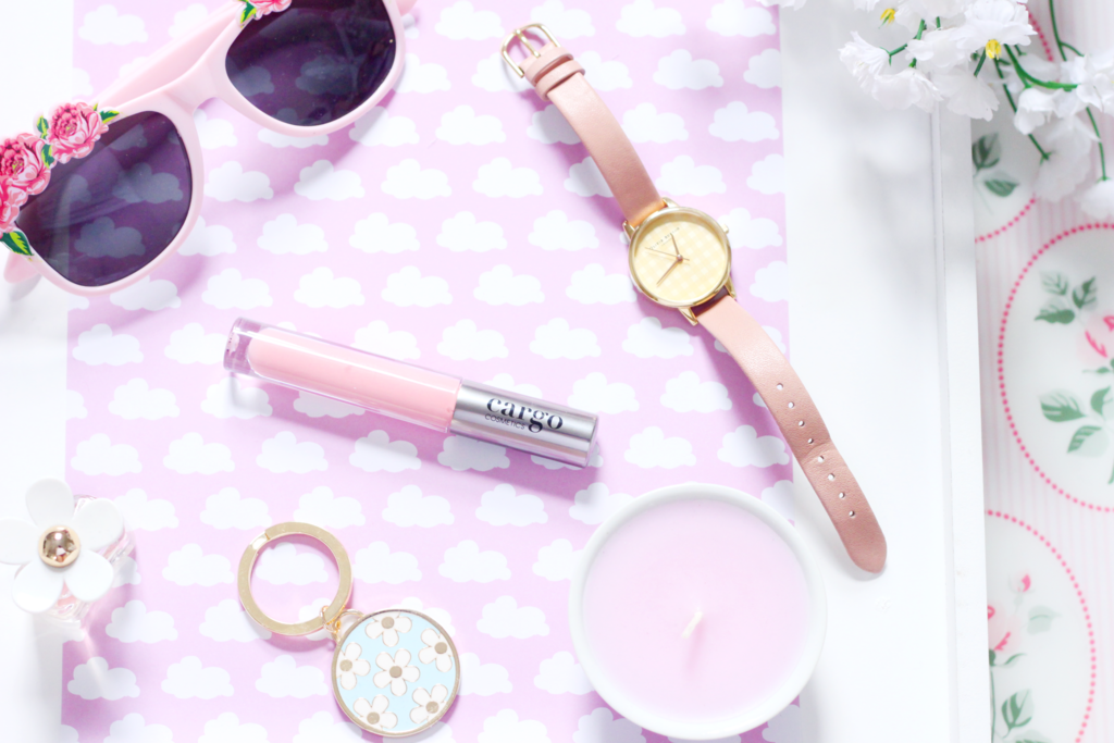 A pictuee of Olivia Burton Watch, Marc Jacobs Daisy, Cargo Cosmetics Lipgloss, Lottie London Blusher Brush and Face Stockholm Blush