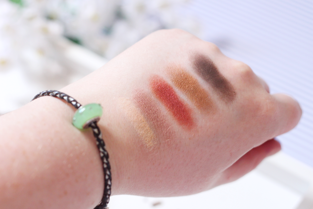 a photo of Zoeva Cocoa Blend Swatches: Bitter Start, Sweeter End, Warm Notes, Subtle Blend and Beans are White